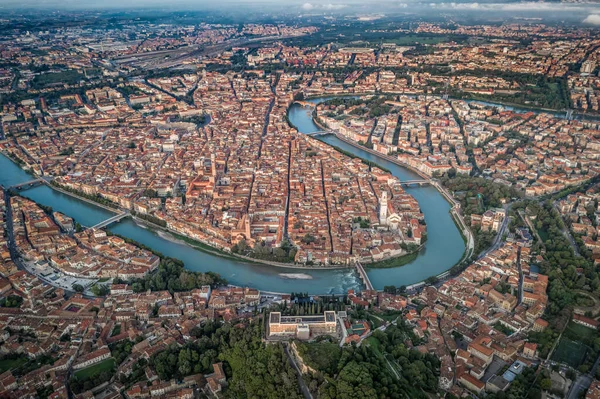 Aerial drone shot view of city of Verona with adige river around — Stock Photo, Image