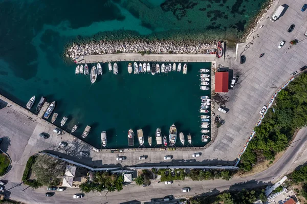 Aerial overhead drone shot of boats at Poros Harbour on Kefalonia Island in Greece