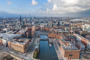 Aerial drone view of port of Hamburg before sunset with clouds aover historical city center clipart
