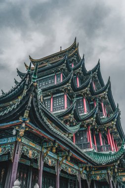 Ancient Hongen Pagoda tower with green tiled red columns in Chongqing, southwest metropolis in China