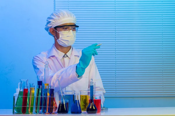 Man scientist holding pen drawing for design work — Stock Photo, Image