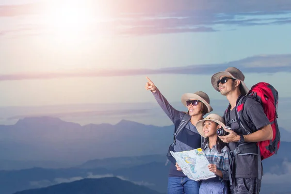 Happy asian family walking in the mountains — Stock Photo, Image