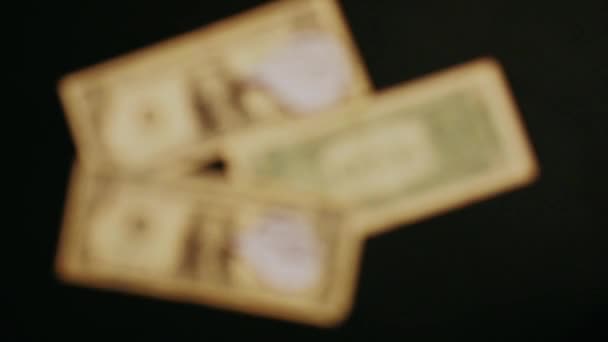 Смішні Виписки Від Імені Банкнот Долари Лежать Чорному Тлі — стокове відео