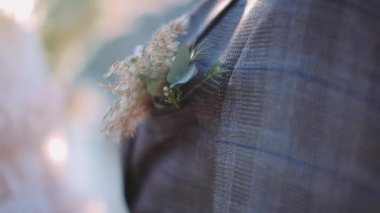 # Ekoseli ceketin düğmesi # # Erkek elbisesinin cebinde #