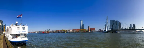Panoramic picture of rotterdam skyline at the port with a boat, blue sky — Stock Photo, Image
