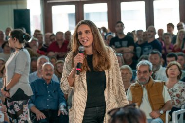 Palma de Mallorca, Spain / November 01, 2019: Lucia Munoz, Candidate of Unidas Podemos to the Congress for the Balearic Islands, at a rally of Pablo Iglesias after general elections clipart