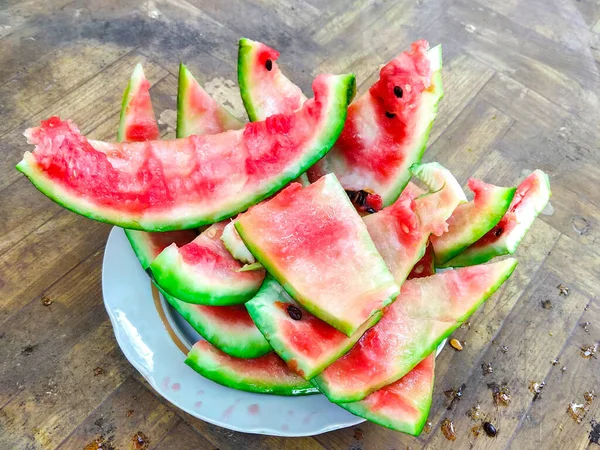 Green Peel Eaten Watermelon Lies White Plate - Stock-foto