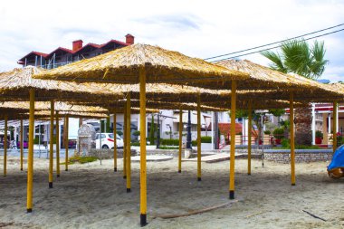  Greece, autumn beach umbrella canopy