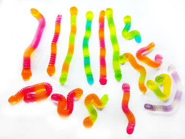 Renkli jöle, solucan şeklinde şekerler. Üst Manzara. Tatlı arkaplan