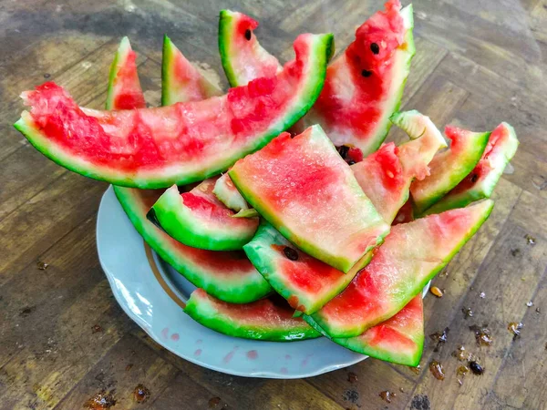 Green Peel Eaten Watermelon Lies White Plate — Stock Photo, Image
