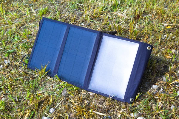 Solar panels or Solar cells energy and tents camping. Small solar cells for carrying to camp in the forest.