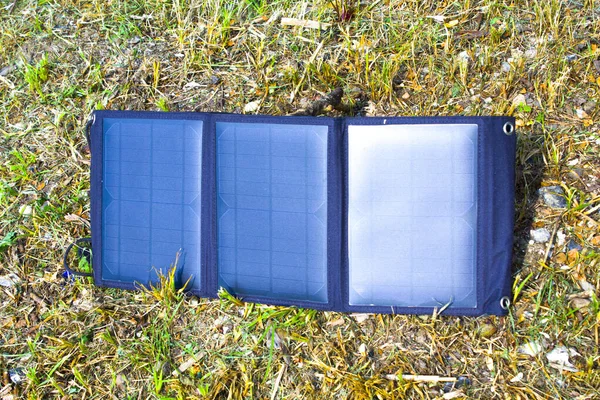 Solar panels or Solar cells energy and tents camping. Small solar cells for carrying to camp in the forest.