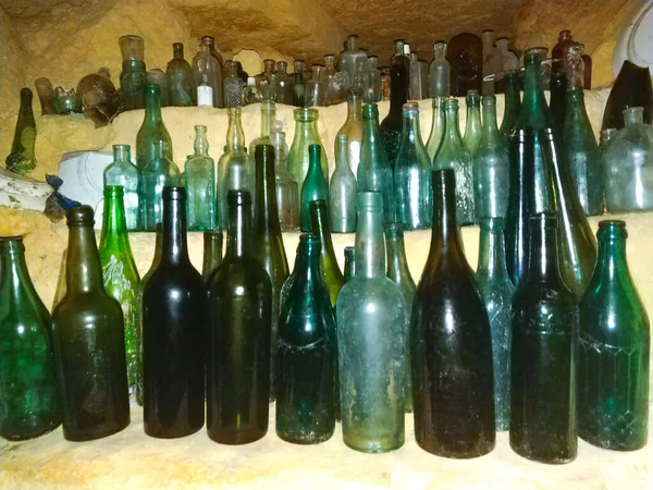 Empty Dark Glass Bottles with Corks. Antique bottles collection.
