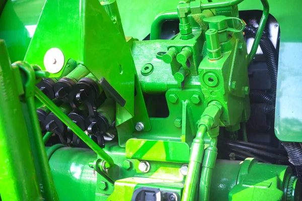 Agricultural machine for fertilizer application. Tractor for chemical treatment. Rear parking light. Fragment.