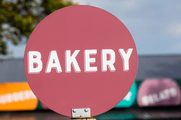 Bäckerei Wort kastanienbraune Scheibe Zeichen — Stockfoto