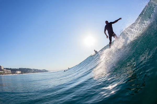 Surfer Silhouetted Surfing Wave Ride Water Photo — Stock Photo, Image