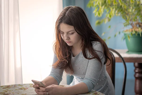 Girl Sitting Home Table Phone House Cozy Bright Girl Happy Stock Picture