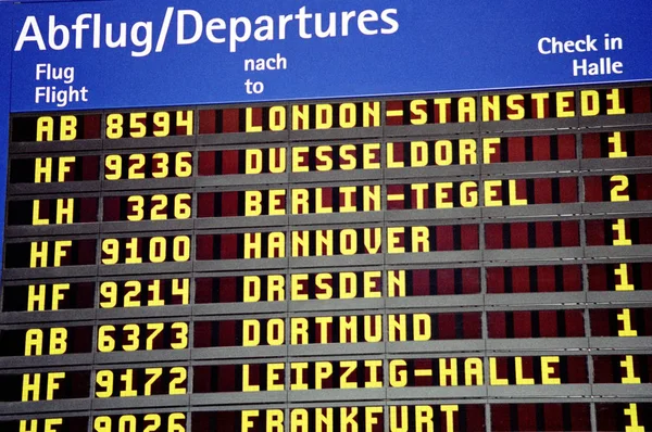 Flughafen Abflugtafel Mit Gelben Und Schwarzen Zahlen — Stockfoto