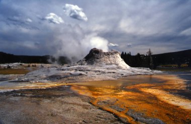 in the upper geyser basin area,a two-hour hike leads through the thermal landscape,which is aimed at sulfur and rotten eggs. clipart