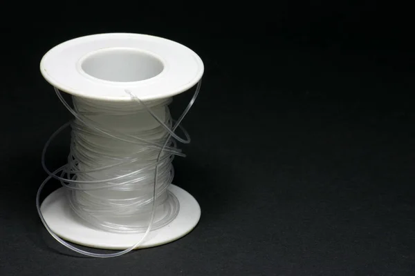 Transparent Thread White Plastic Roll — Stock Photo, Image