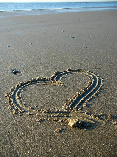 Сердце Песке — стоковое фото