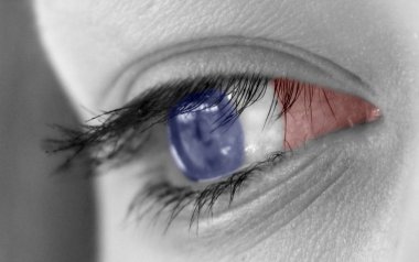 eye with french flag close up shot clipart