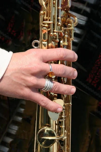 Close Hand Holding Trumpet — Stock Photo, Image