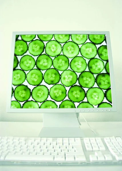 green laptop computer and tablet pc on white background