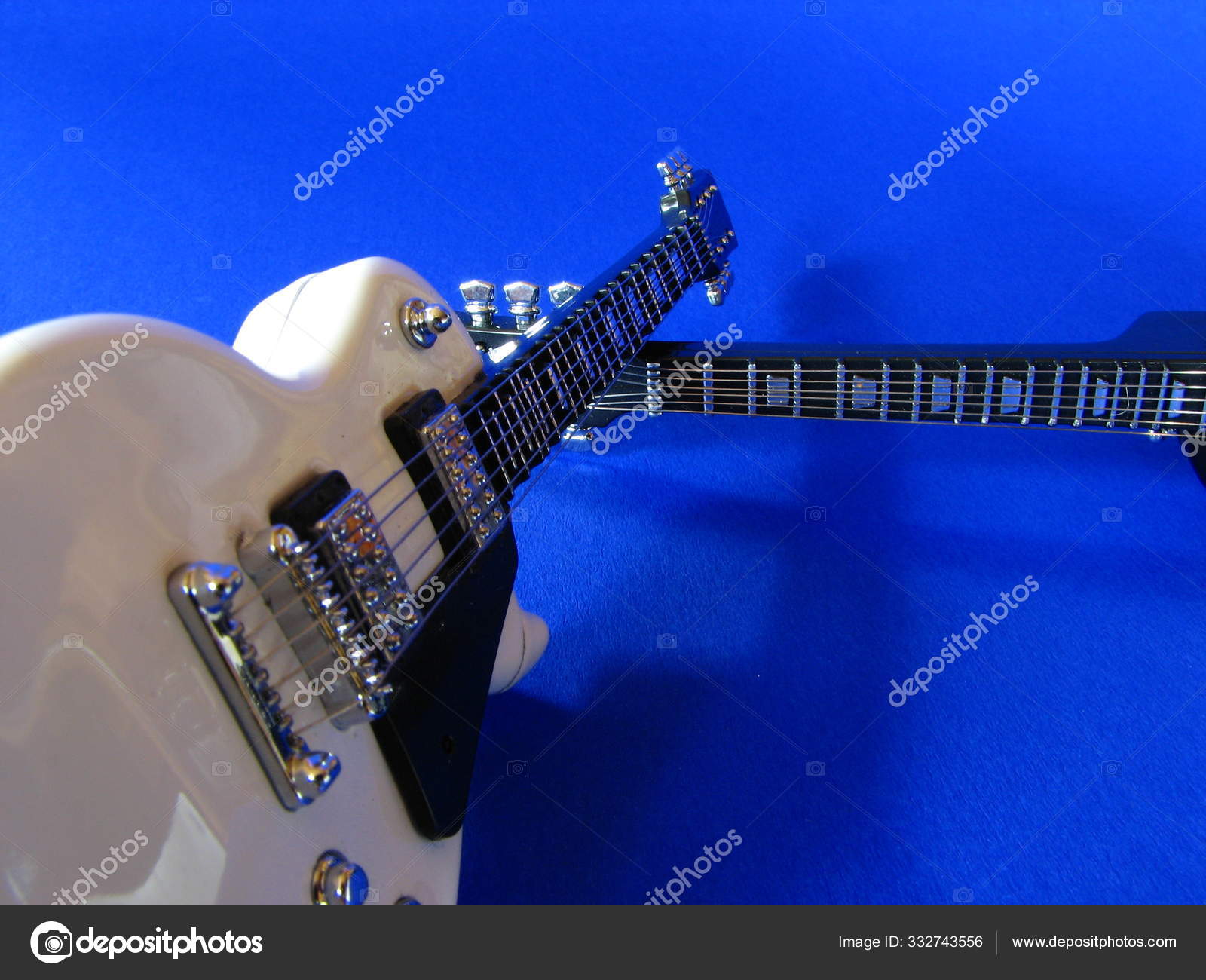 Electric Guitar Blue Background Stock Photo by ©PantherMediaSeller