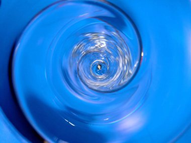water drop on blue background clipart
