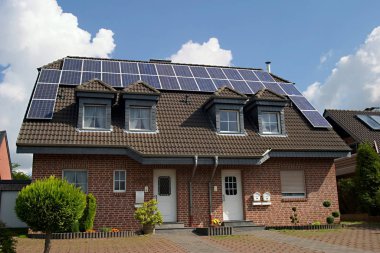 solar panels on house roof clipart