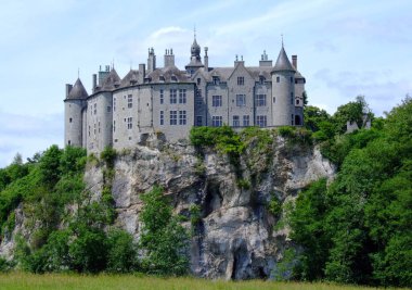 chateau de walzin above the lesse in the belgian ardennes clipart
