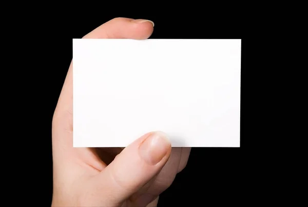 Mão Segurando Cartão Branco Isolado Preto — Fotografia de Stock