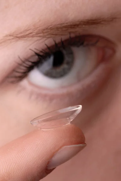 close-up of a female eye with a contact lens