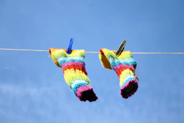 Colorful Socks Hanging Clothesline Blue Sky Background — Stock Photo, Image