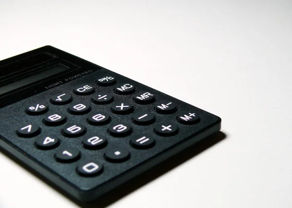 Czarny Kalkulator Liczbami Odizolowanymi Białym — Zdjęcie stockowe