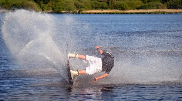 Young Man Blue Jacket Jumping Water River — Stock Photo, Image