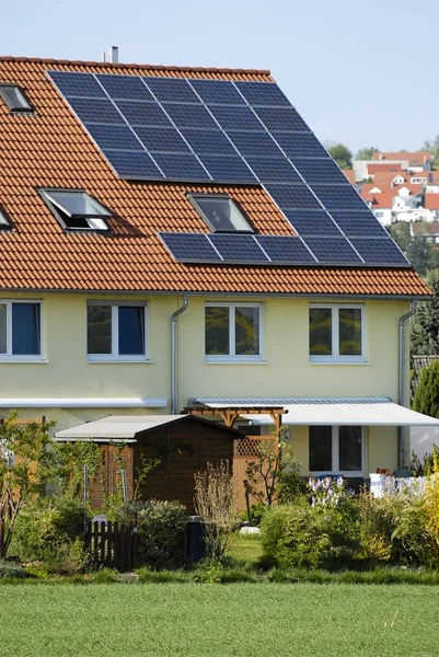 family house with solar panels