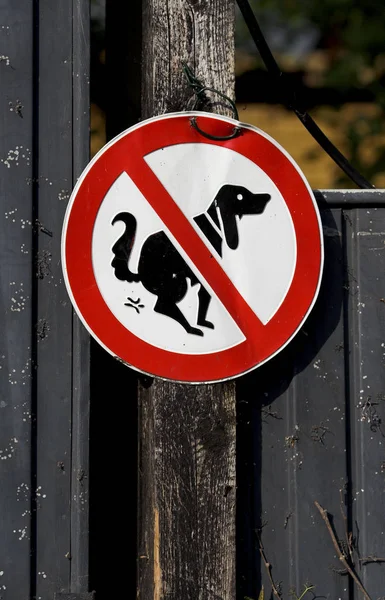 no dogs sign in the park