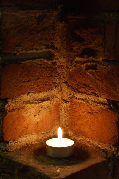 Burning Candle Old Fireplace — Stock Photo, Image