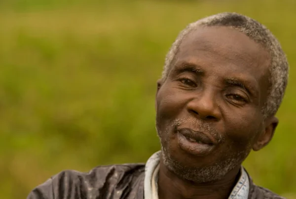 .... again a picture of my africa series. papa paul,as he is called in the village,is an institution. he speaks very well french,which is not self-reliance among old people in cameroon,he is a messenger and represents the priest with much