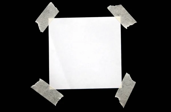 Bílý Papír Přilepený Černém Pozadí — Stock fotografie