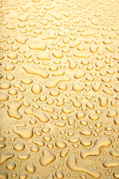 Waterdruppels Gouden Achtergrond — Stockfoto