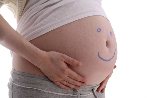 Jonge Zwangere Vrouw Met Een Stethoscoop Stockafbeelding