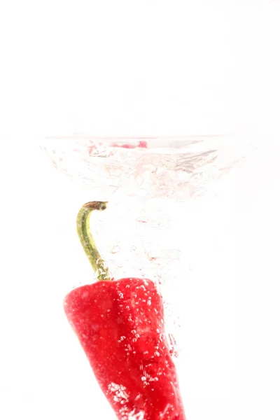 Spruzzi Pepe Rosso Sfondo Bianco — Foto Stock