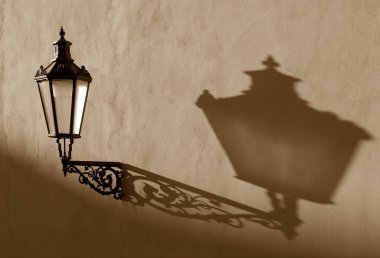 old street lamp on the wall clipart