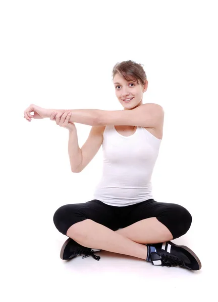 Młoda Kobieta Robi Ćwiczenia Jogi Izolowane Białym Tle — Zdjęcie stockowe
