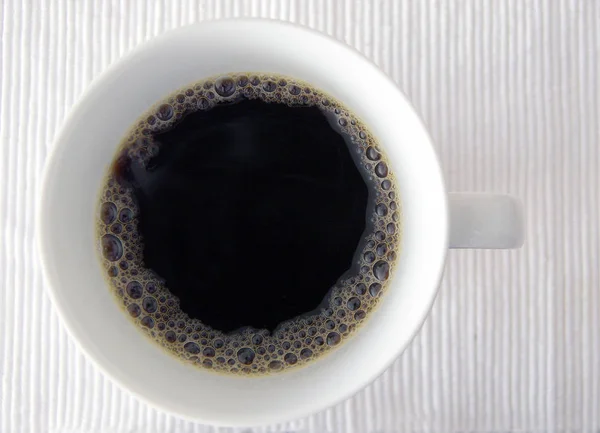 Tahta Arka Planda Bir Fincan Kahve — Stok fotoğraf