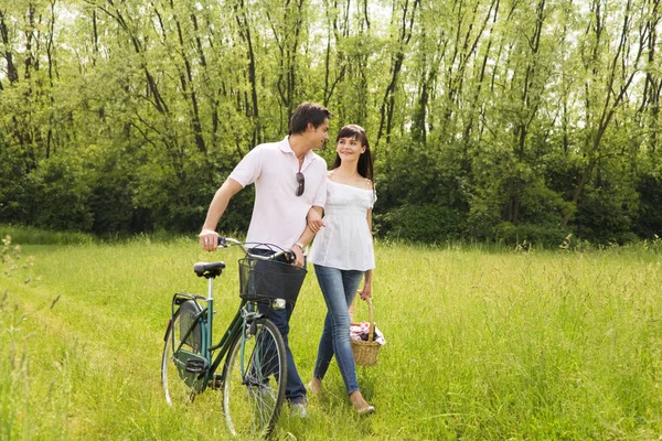 Happy Couple Love Walking Field Bicycle Stock Picture