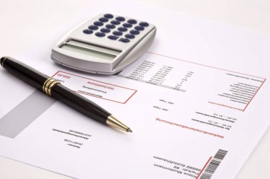 financial contract and pen on the table clipart